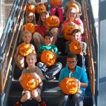 Students and their carved pumpkins