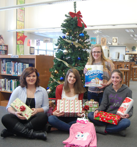 Pictured are (from left to right), Giving Tree Co-Chair, Katie Stringer, Student Council Vice-President, Rachel Shelley, Student Council President, Lindamarie Olson, Giving Tree Co-Chair, Haley George
